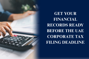 Business professionals preparing financial records, accounting documents, and tax reports for UAE Corporate Tax filing and Federal Tax Authority compliance.